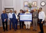 Raksha Mantri Shri Rajnath Singh receiving interim dividend cheque of Rs 21.62 crore for Financial Year 2021-22 from Chairman and Managing Director of Mishra Dhatu Nigam Limited (MIDHANI) Dr Sanjay Kumar Jha in New Delhi on March 31, 2022. Also seen is Defence Secretary Dr Ajay Kumar.